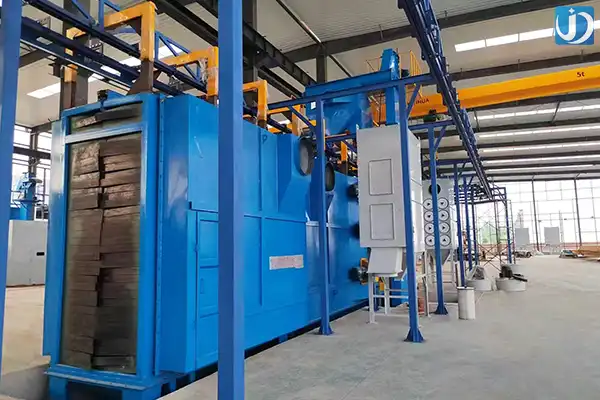Why Is a Pass-Through Shot Blasting Machine Used in Continuous Production?